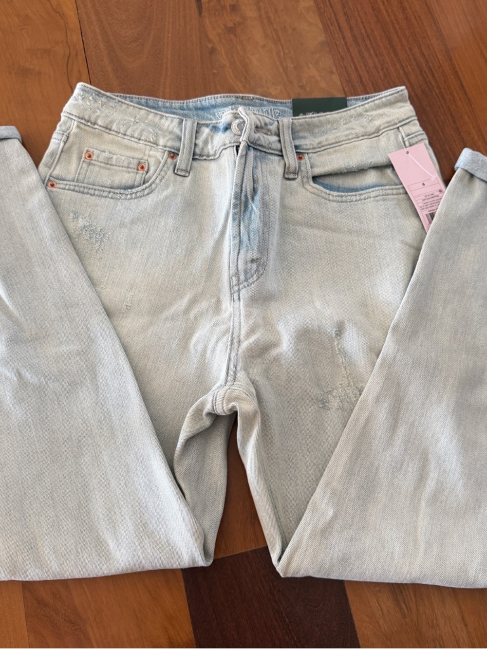 Light Wash Straight Leg Women's Jeans with rips